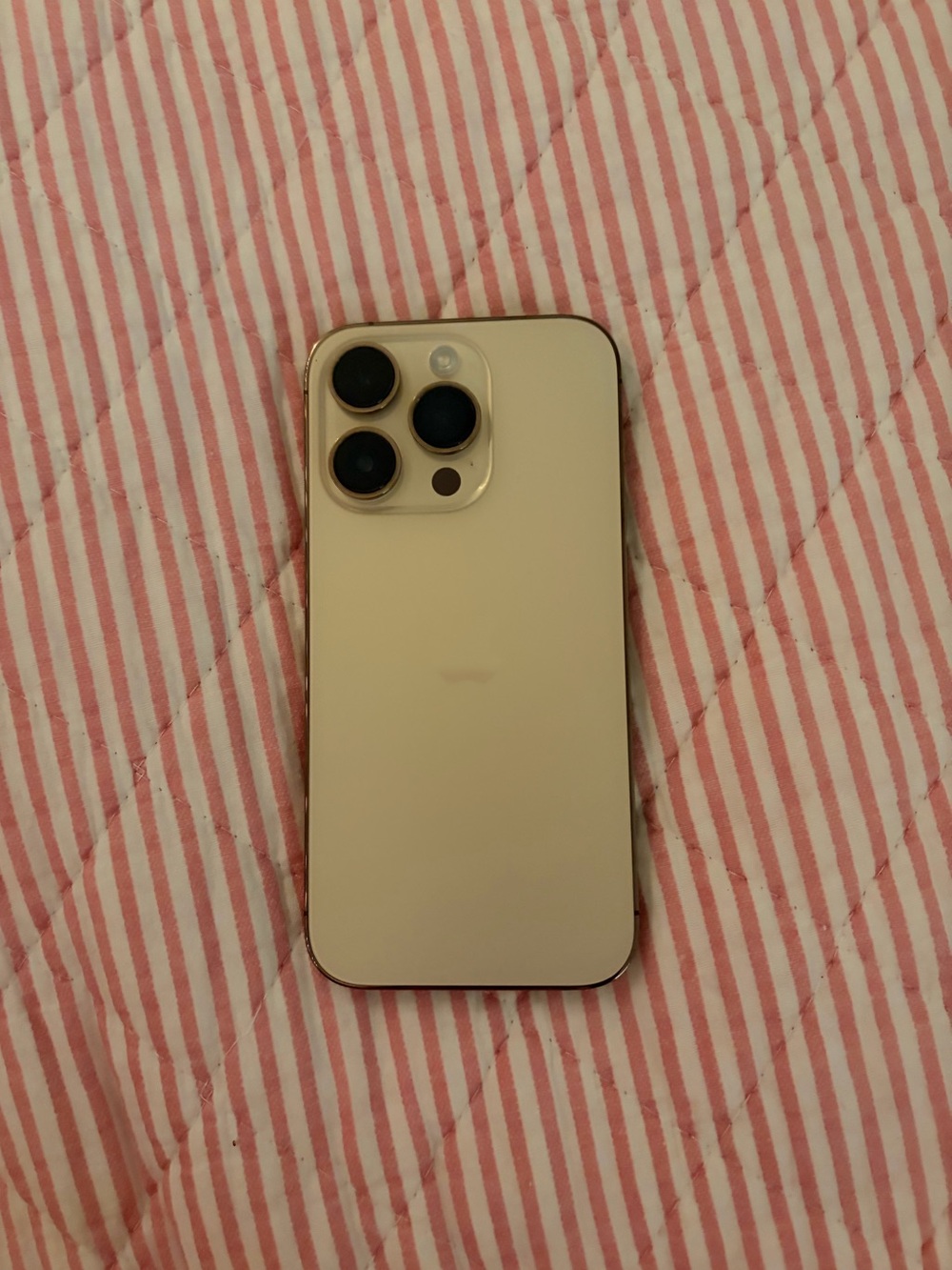 Apple iPhone 14 Pro  - Gold Finish, like new. When bought only used for a week.